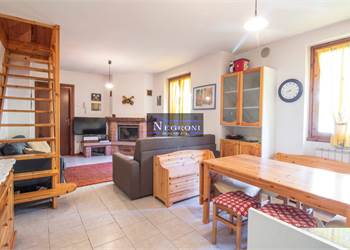 Three-room apartment with fireplace in Gandellino
